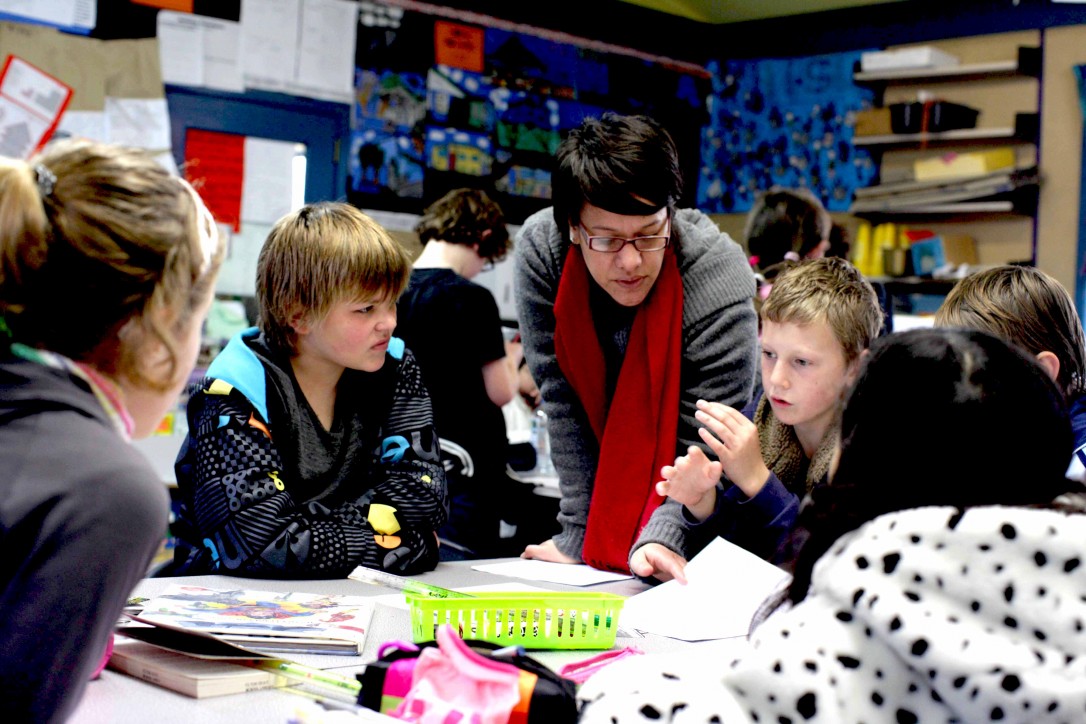Teacher and students working in a small group