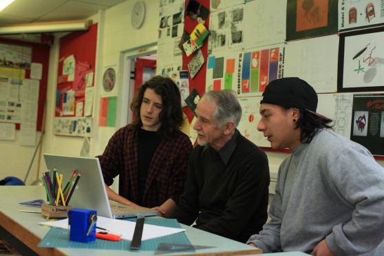 IMG students and teacher in discussion